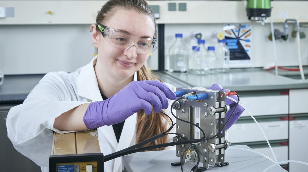Young woman with glasses to protect her eyes